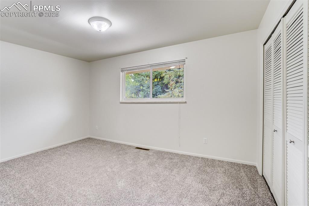 Image 21 of 44: Bedroom 2 on upper level