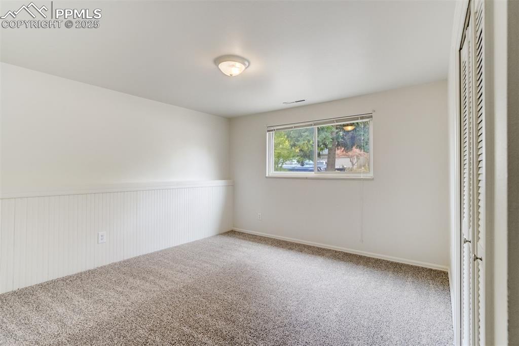 Image 28 of 44: Bedroom 4 in lower level