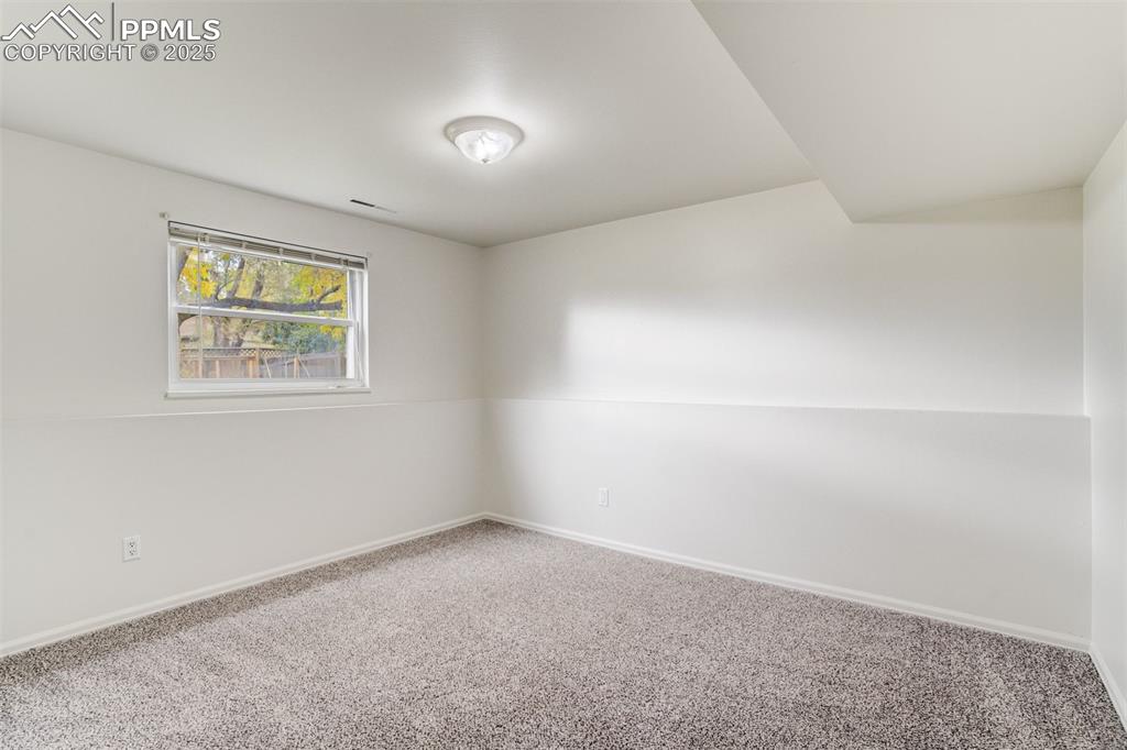 Image 30 of 44: Bedroom 5 in lower level