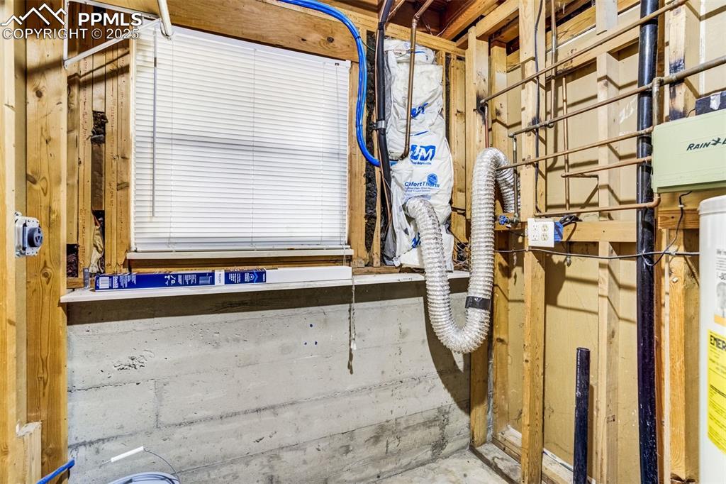 Image 33 of 44: Laundry area with a window for brightness