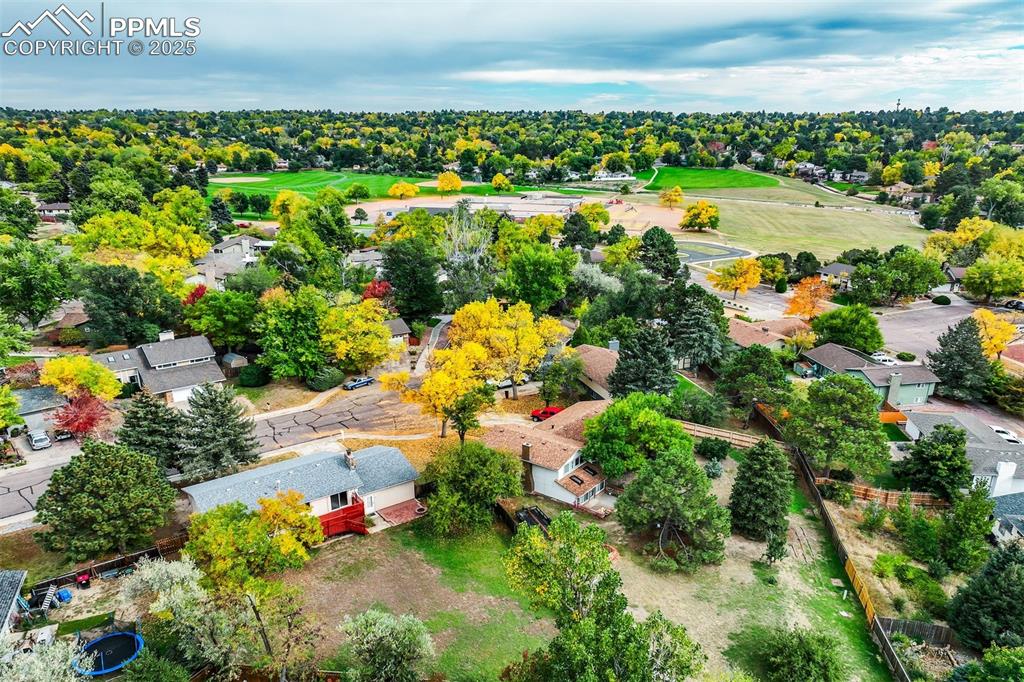 Image 41 of 44: Aerial view of rear yard and neighborhood