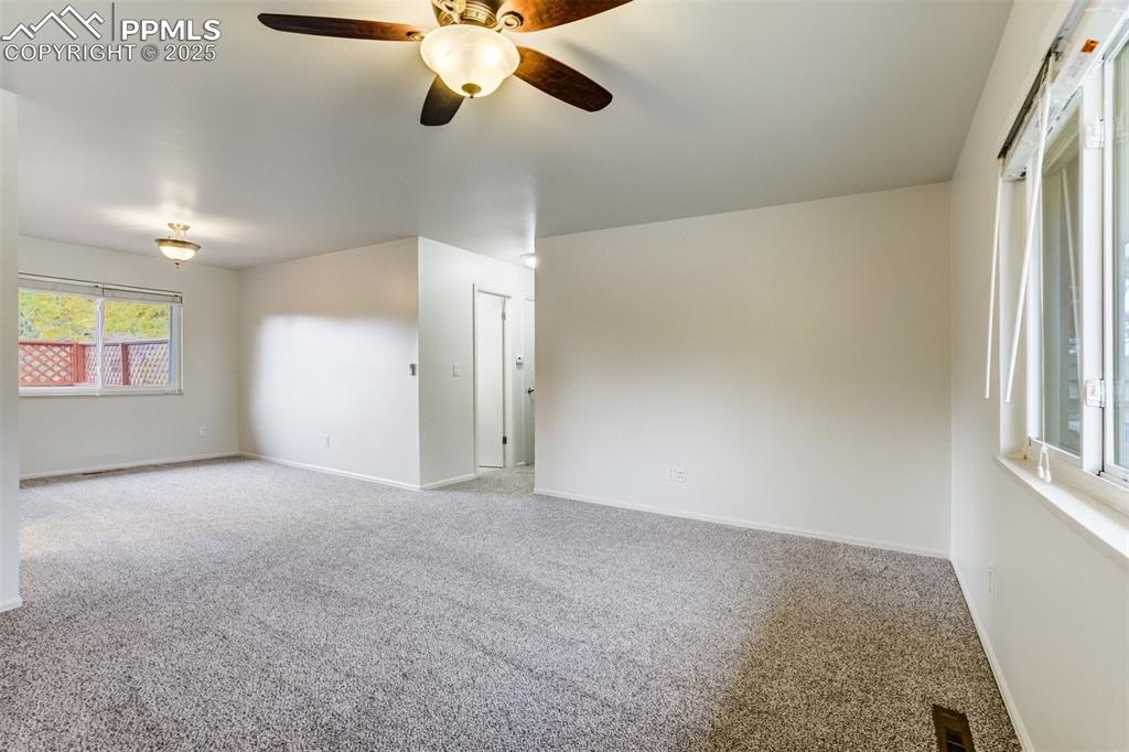 Image 5 of 44: Living room opens nicely into dining room