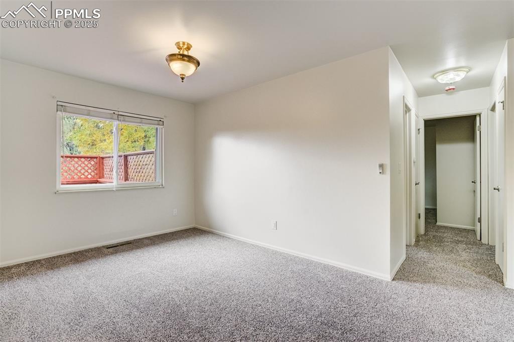 Image 7 of 44: Dining room window also shows the deck lattice and railing