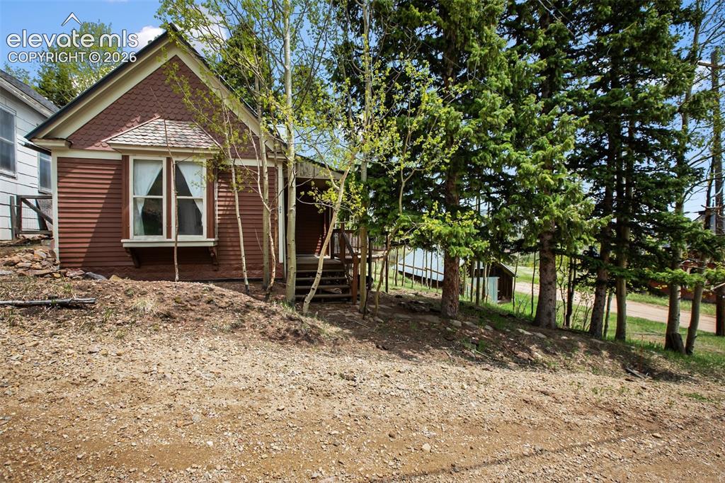 Image 6 of 36: another view from the west, looking right at the bay window