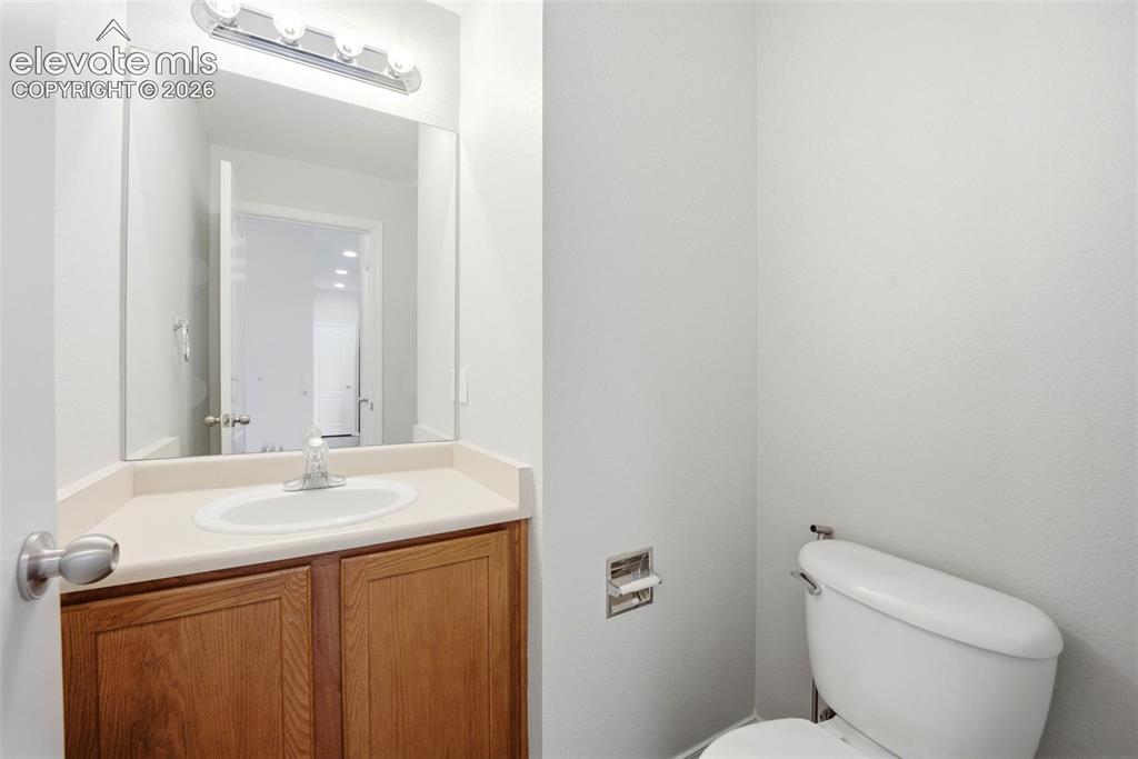 Image 20 of 49: Main level half bath