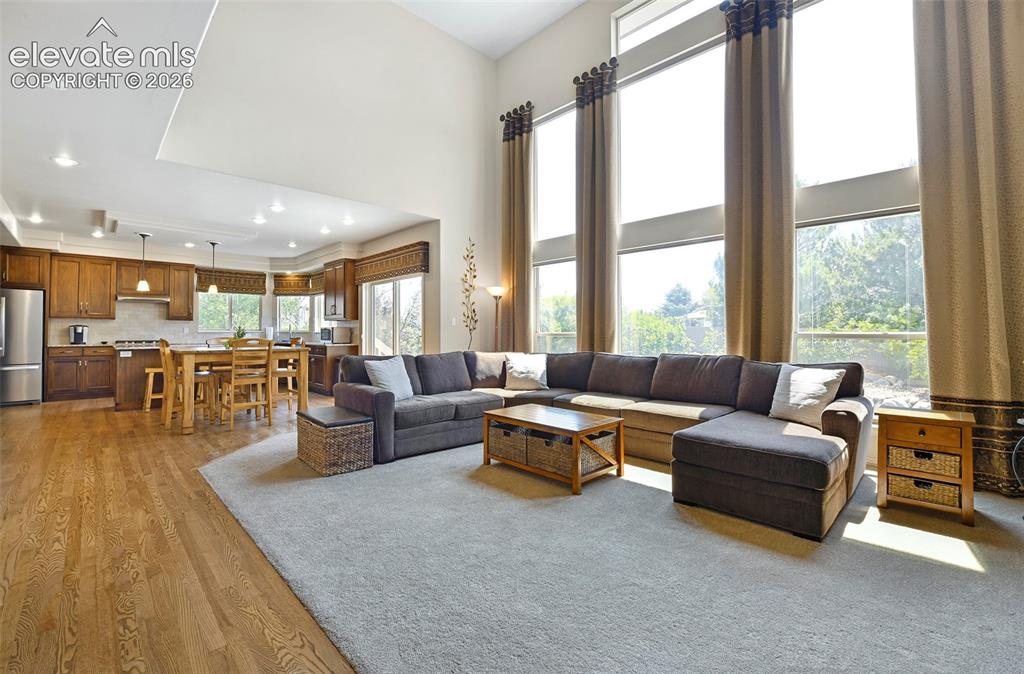 Image 11 of 46: ...Open to the kitchen and a secondary dining area