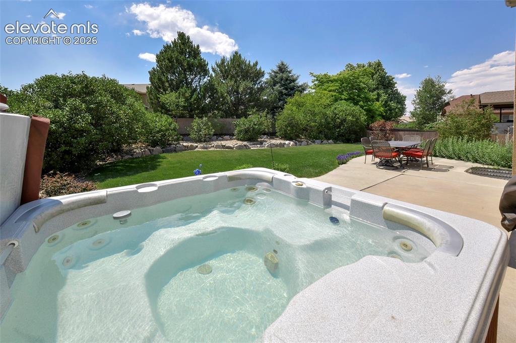 Image 41 of 46: Relax in the spacious hot tub!