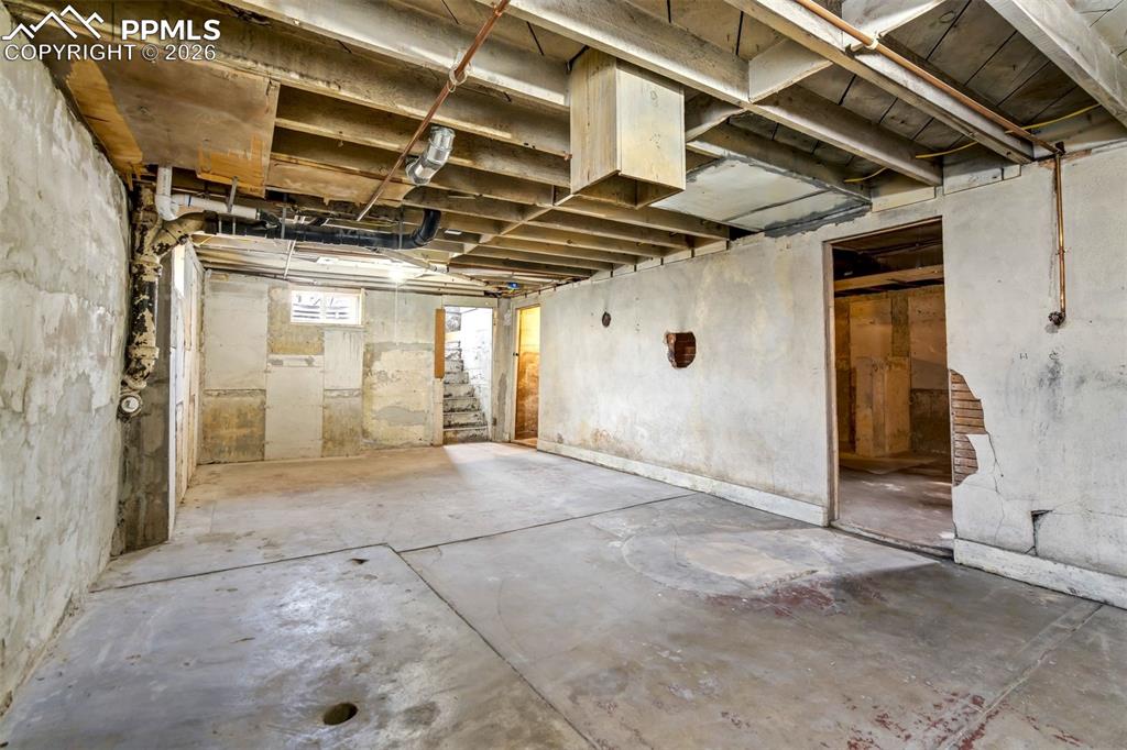 Image 32 of 38: Full unfinished basement offering excellent storage or future expansion pot