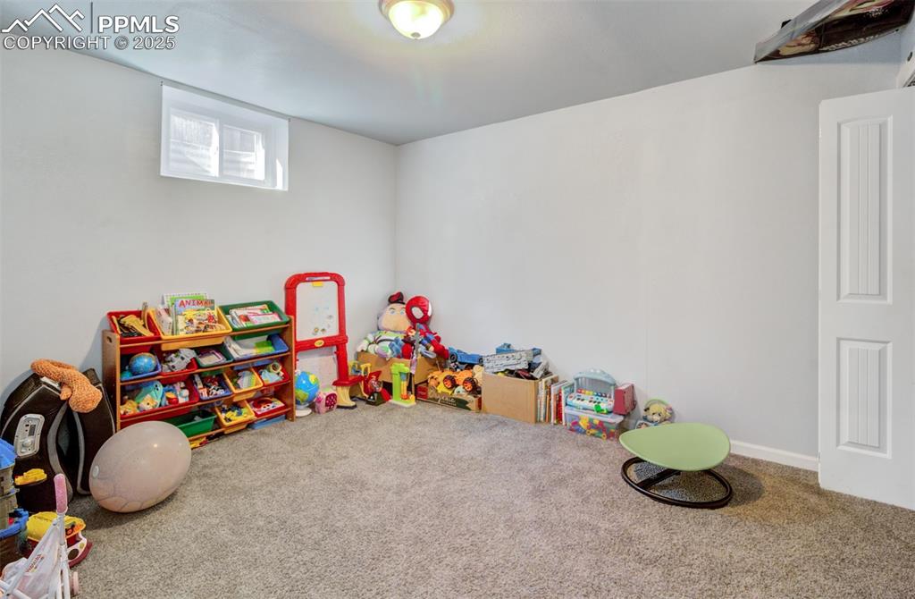 Image 23 of 29: Rec room featuring carpet floors