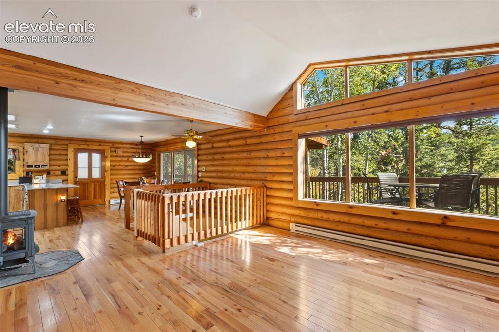 Image 10 of 37: Family room and dining room.  