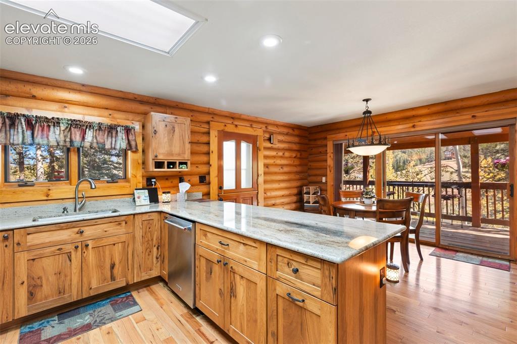 Image 14 of 37: Kitchen and dining room.