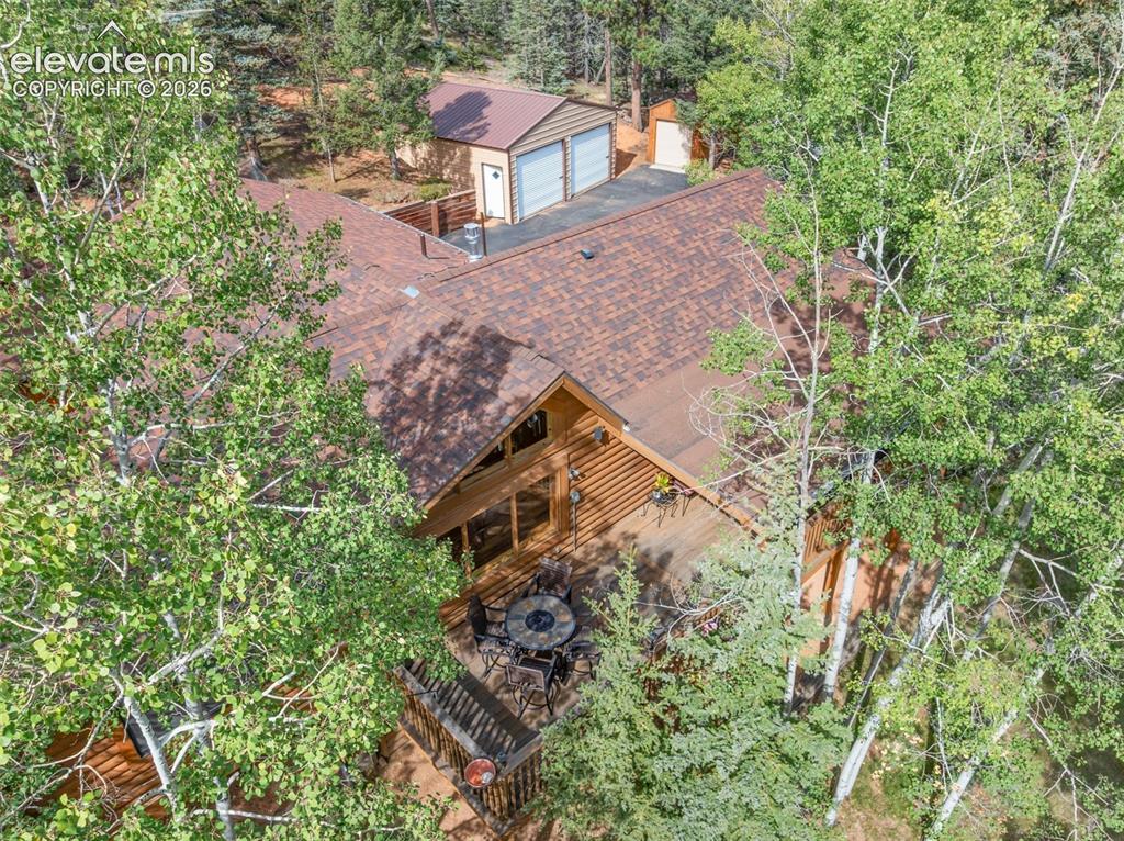 Image 33 of 37: Ariel View of of house and Garage and Utility Garage.