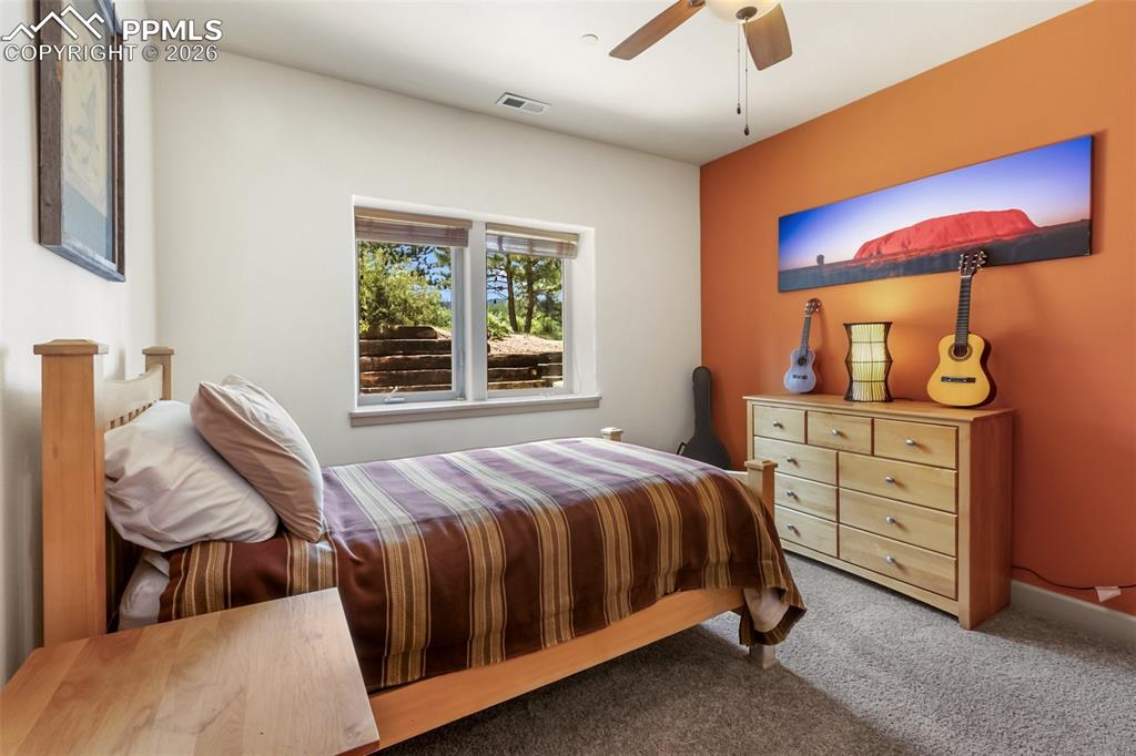 Image 34 of 44: Basement bedroom