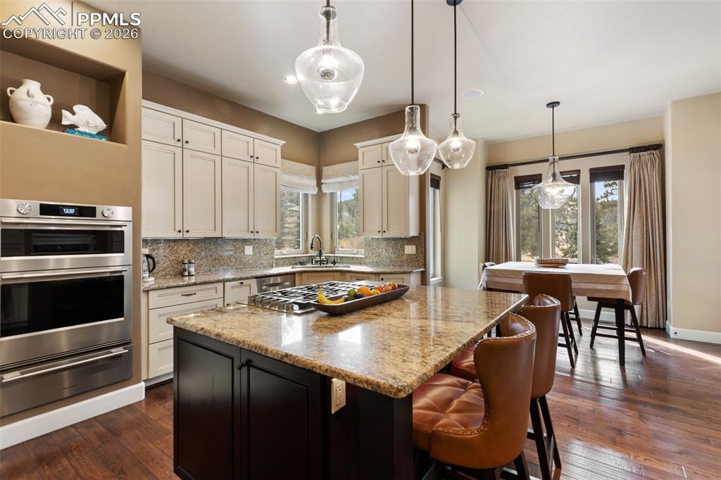 Image 8 of 44: Kitchen with Kitchen Aide Stackable oven.