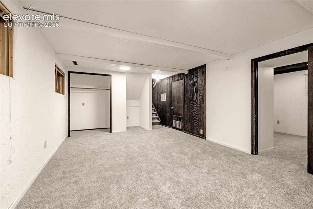 Image 31 of 45: Family room in basement