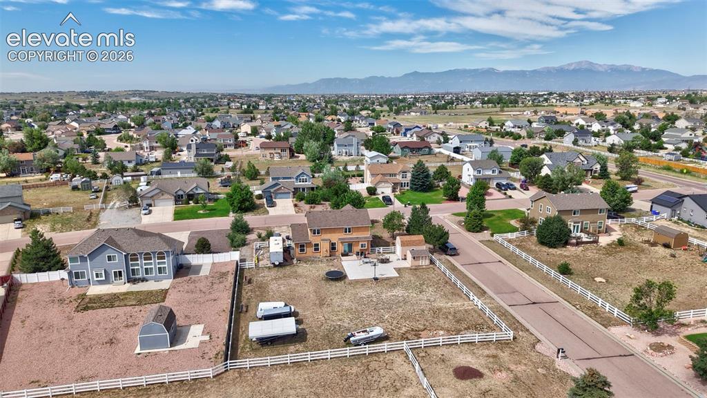 Image 29 of 39: Suburban neighborhood with varied residential architecture