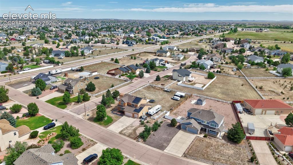 Image 30 of 37: Expansive residential area featuring a variety of single-family homes, matu