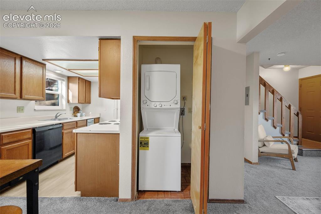 Image 12 of 27: Ground floor laundry closet