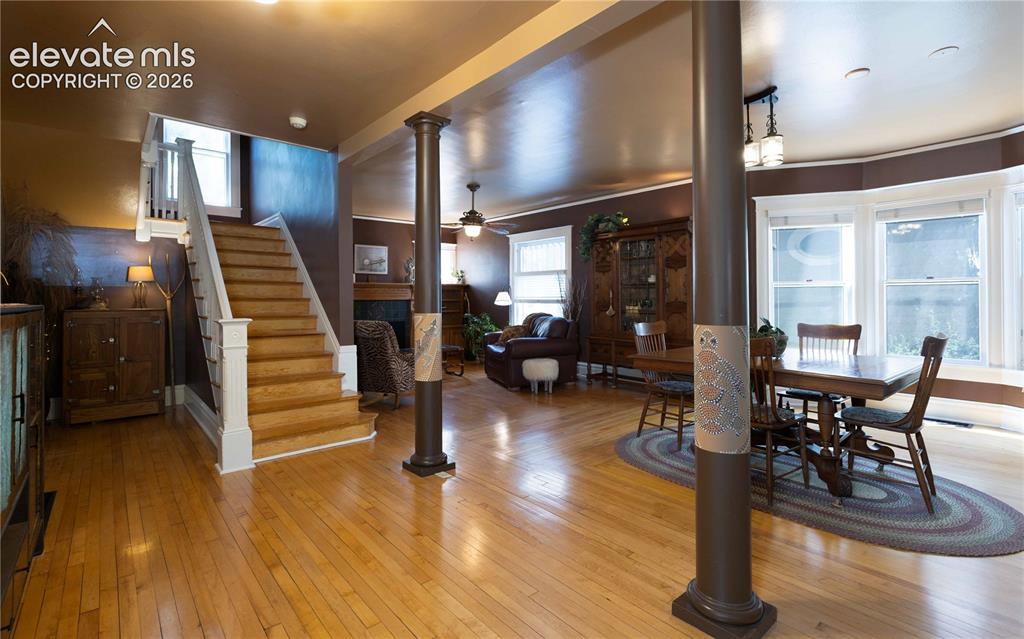 Image 11 of 37: Rebuilt staircases and gleaming hardwood