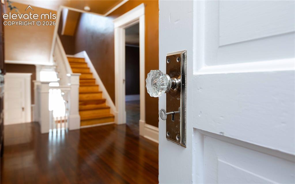 Image 13 of 37: Beautiful sunlight pours onto the second story foyer leading to 4 bedrooms