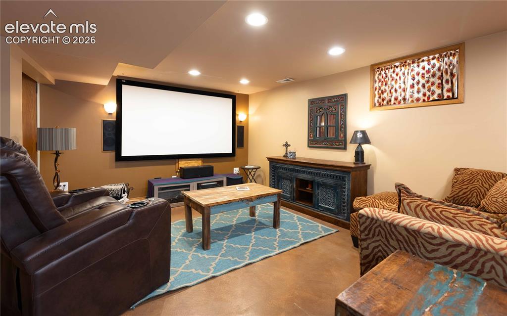 Image 22 of 37: Theater room for entertaining and relaxing