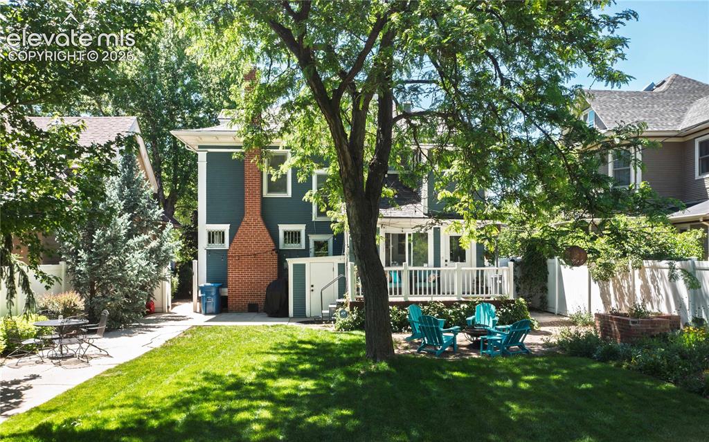 Image 33 of 37: 6-foot privacy fence and 3 locking gates create privacy and security