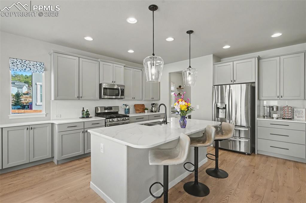 Image 4 of 40: Modern touches throughout with a coffee station to boot! 