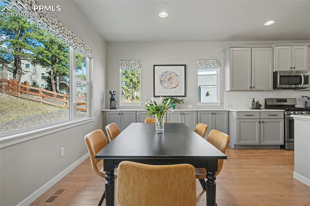 Image 5 of 40: Dining area large enough for entertaining or...