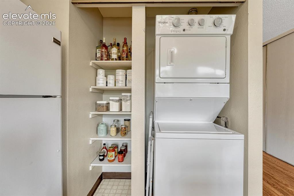 Image 15 of 50: Kitchen pantry; washer/dryer included!