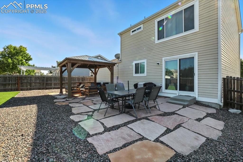 Image 23 of 33: View of patio with a gazebo