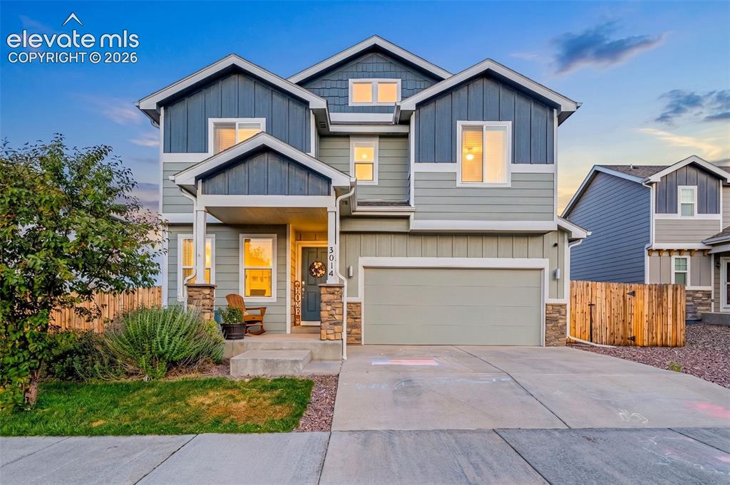 Image 1 of 37: Multi-level exterior featuring varied siding materials and stone accents
