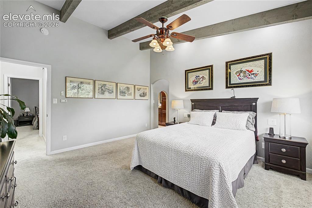 Image 19 of 50: The abundantly sized primary suite showcases the seamless way of life this