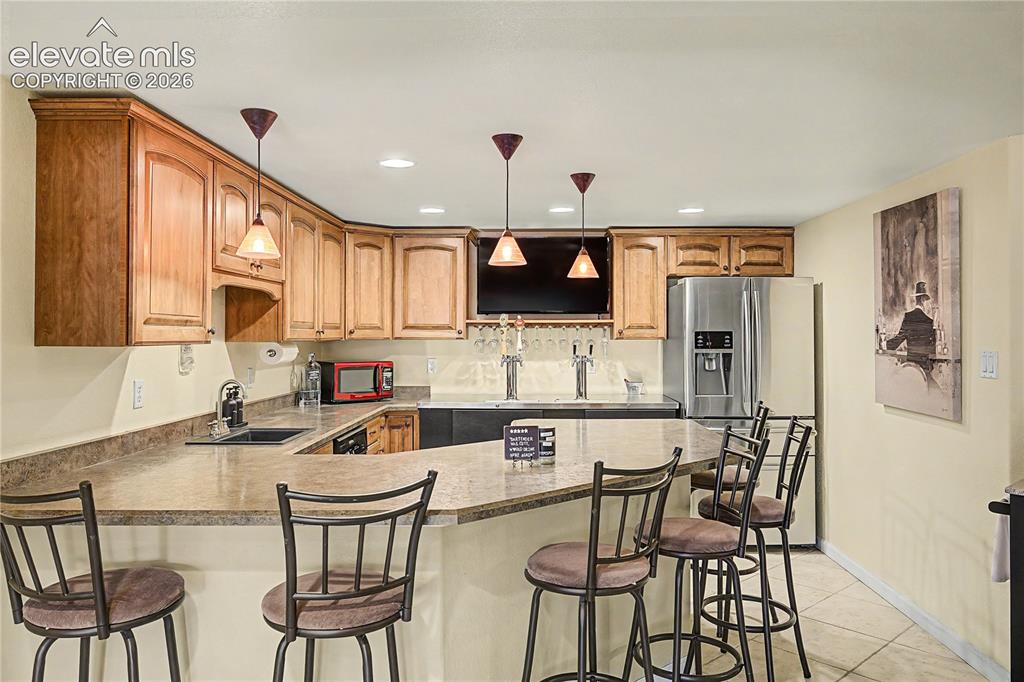 Image 31 of 50: The wet bar