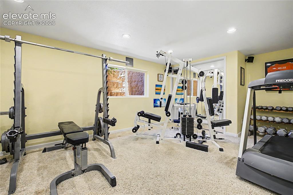 Image 34 of 50: The lower level also includes a private home gym, giving future owners flex