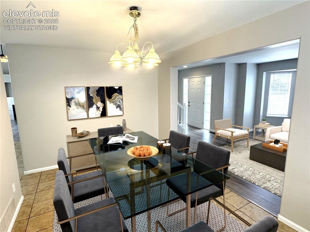 Image 4 of 50: Dining Room - virtually staged