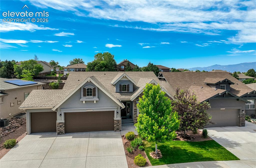 Image 1 of 48: Timeless architecture, mature landscaping + a welcoming streetscape create 