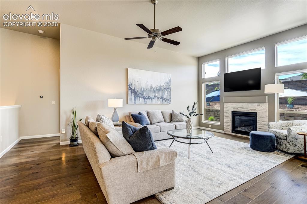 Image 11 of 48: The great room serves as the heart of the home, where soaring ceilings, exp
