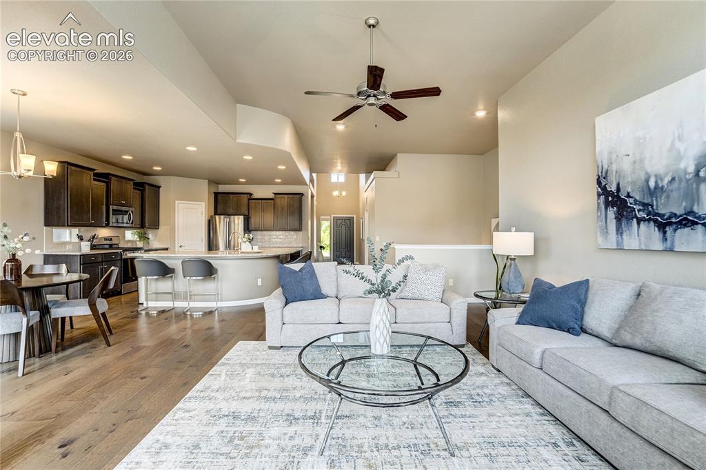 Image 14 of 48: Thoughtfully connected living spaces allow conversation and connection to f