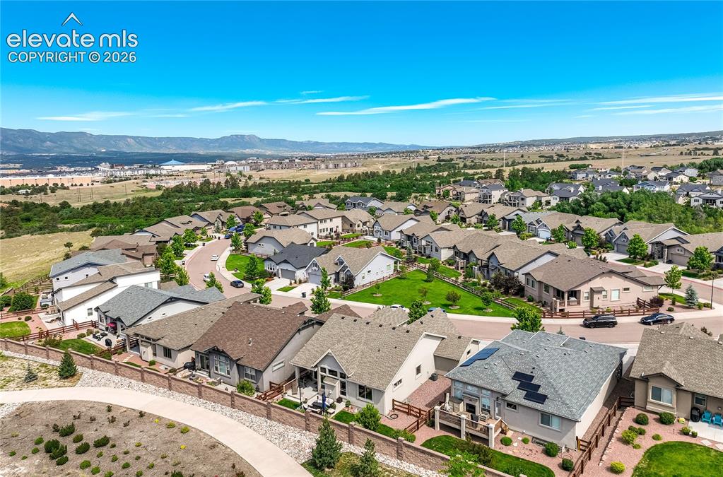 Image 4 of 48: Nestled within a gated community, residents enjoy a beautifully maintained 