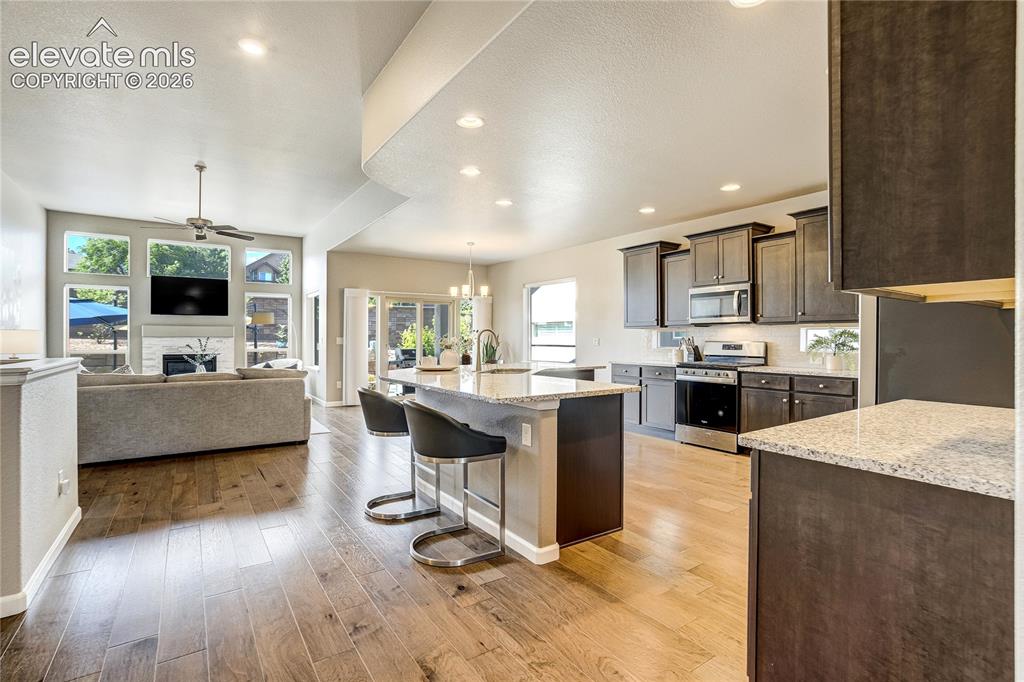 Image 9 of 48: Designed for modern living, the open-concept floorplan creates effortless f