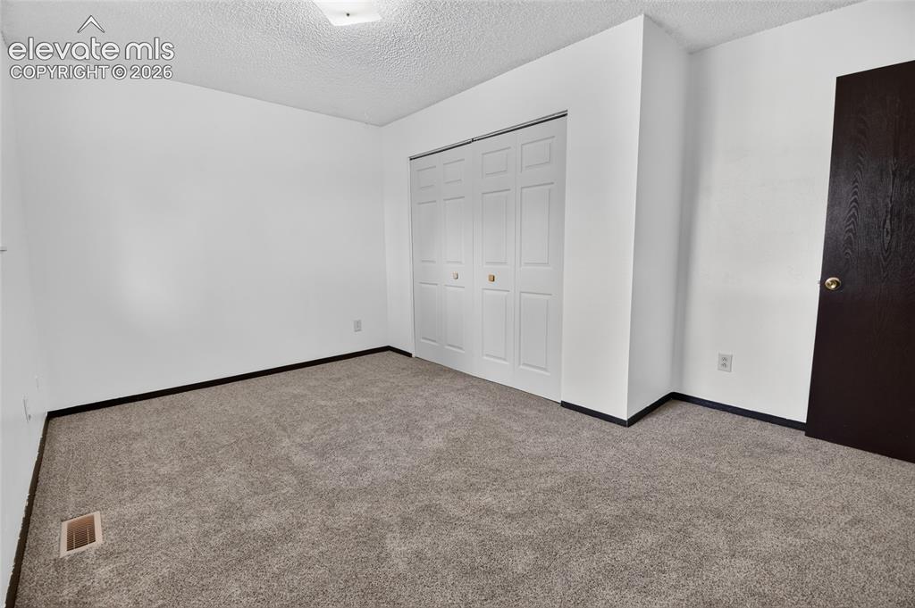 Image 19 of 36: Bedroom
