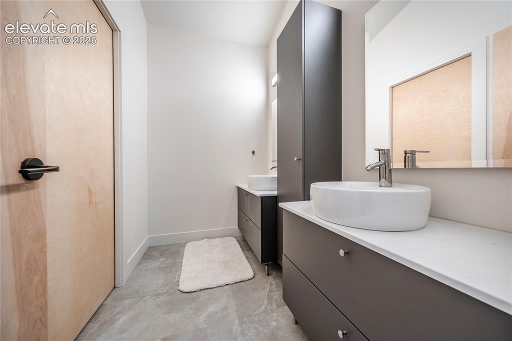 Image 20 of 49: Upstairs Bathroom- Primary Home