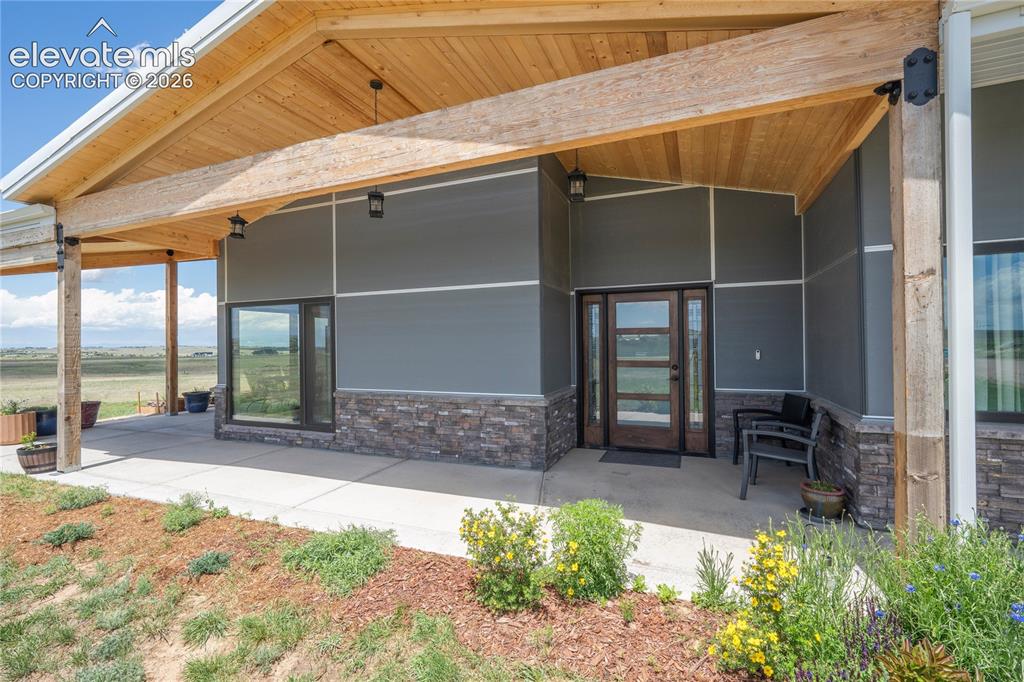 Image 24 of 49: Wrap Around covered porch- ADU