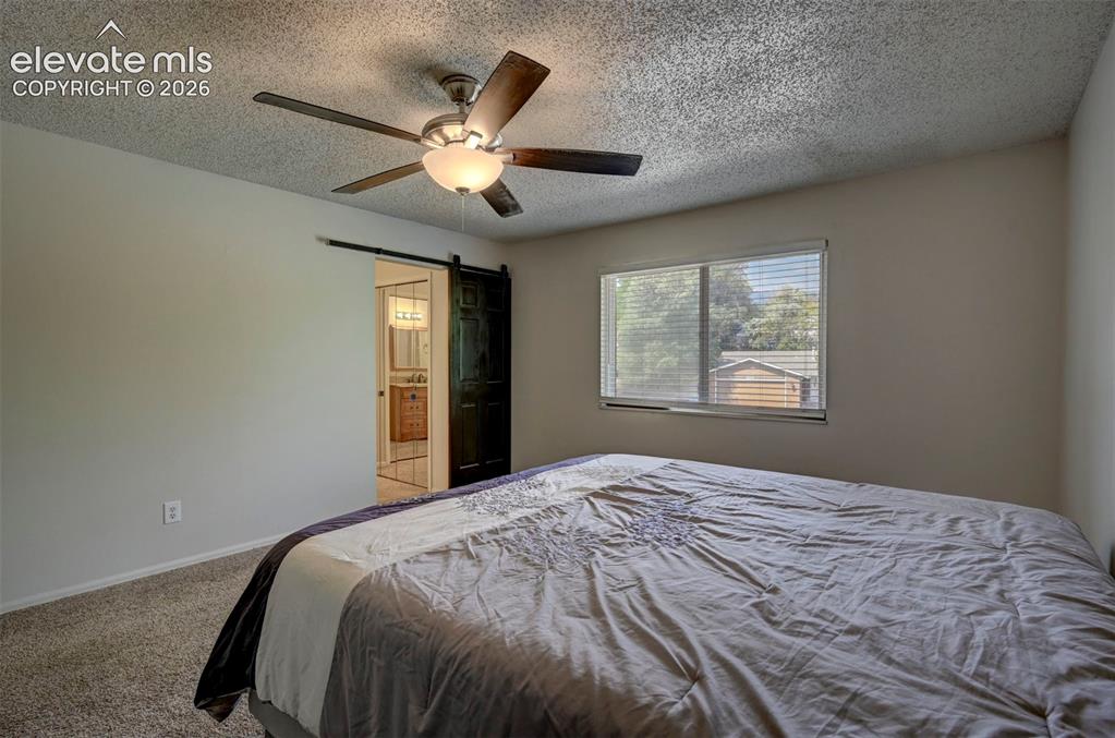 Image 27 of 49: Ceiling fan with integrated lighting