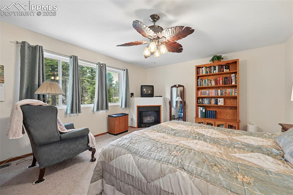 Image 9 of 25: Room featuring light-toned walls and neutral carpeting