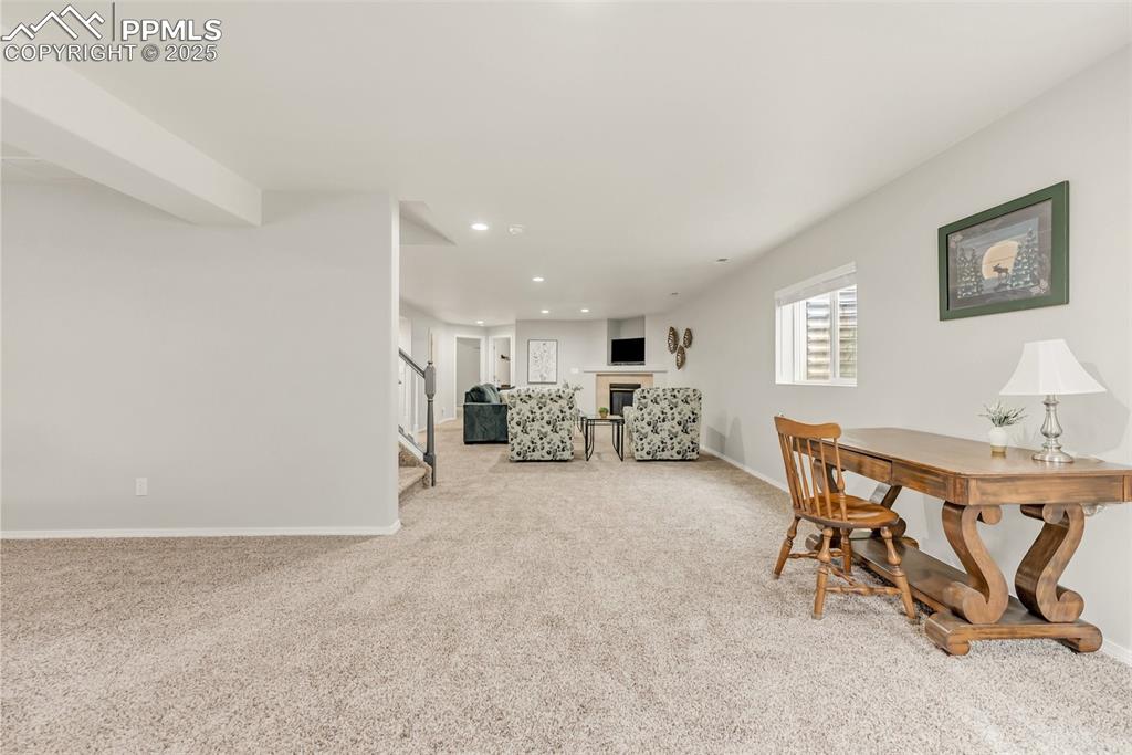 Image 44 of 47: Huge bonus space in basement is great for kids play area separate from sitt