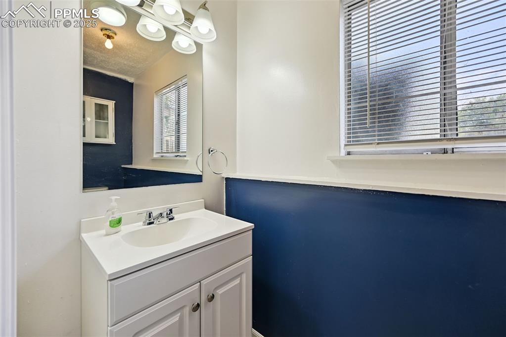 Image 10 of 19: Bathroom with vanity