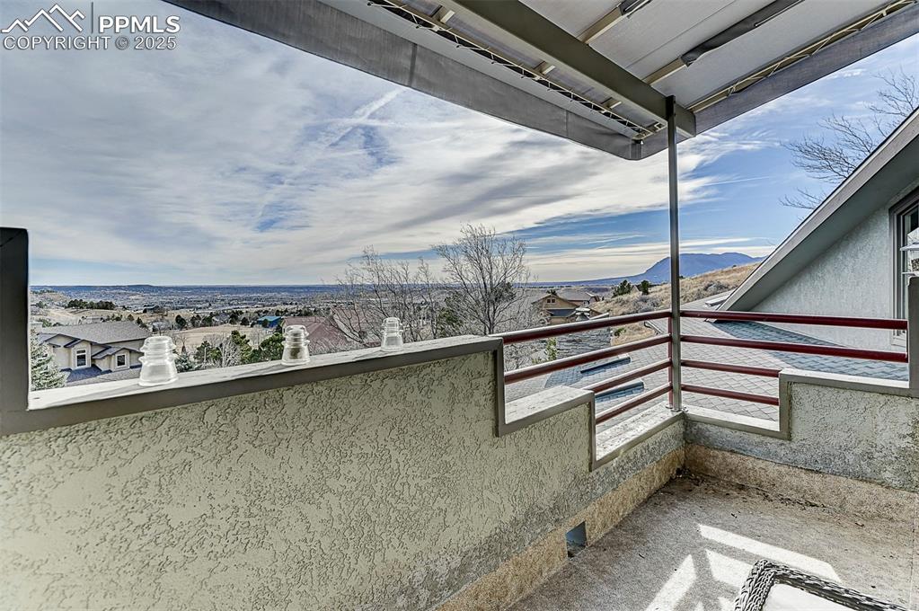 Image 38 of 42: Primary suite balcony with stunning views.