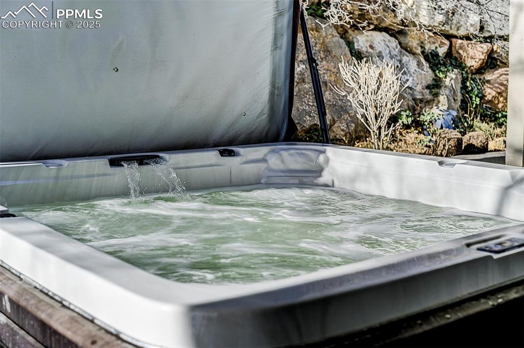 Image 41 of 42: Exterior view of a salt water jacuzzi.