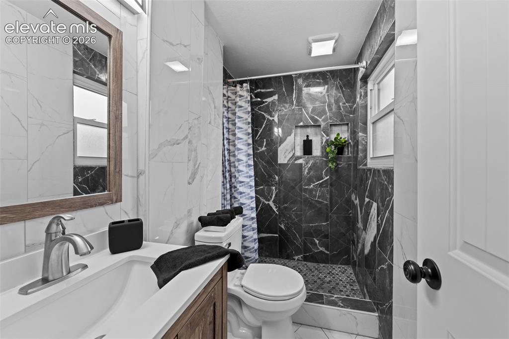 Image 15 of 38: Nice tile shower